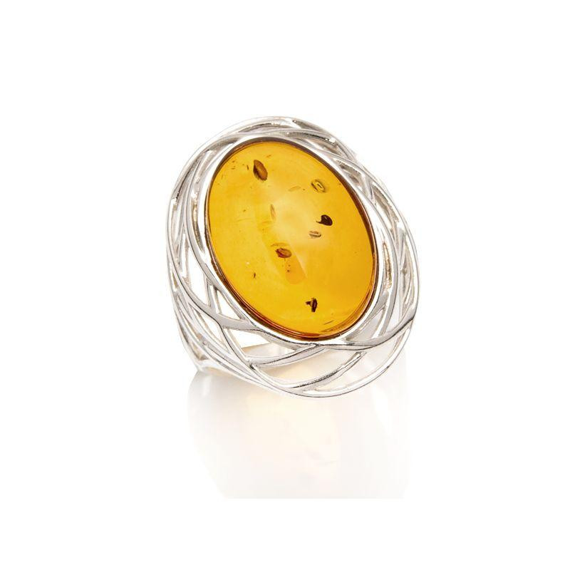 Anello grande pietra ambra cognac — ricordo nostalgico