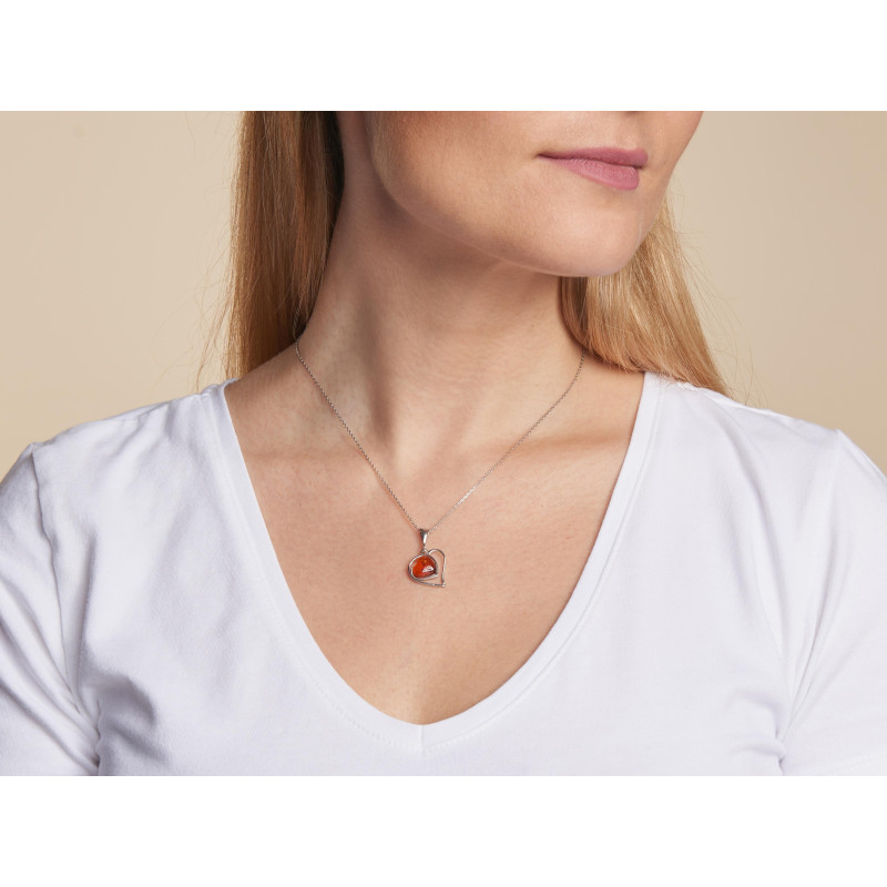 Ciondolo d'argento 925 rodiato con ambra cognac: custodire l'amore — foto 1