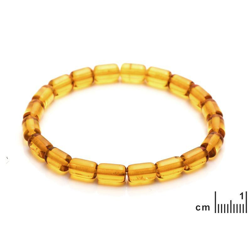 Bracciale in ambra cognac cilindrica — per custodire una luce antica — foto 1