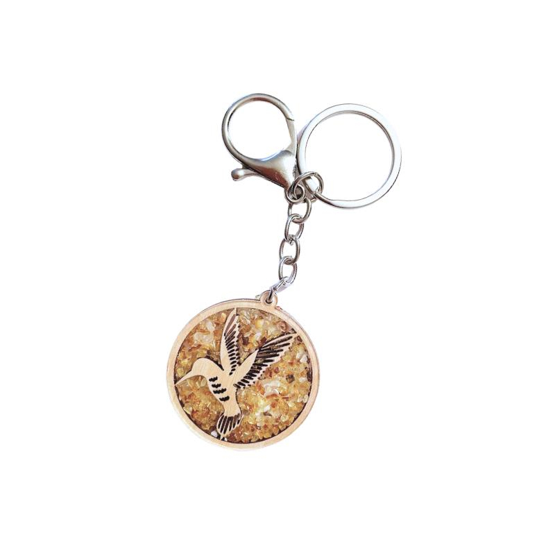 Porta chiavi di betulla con ambra marina e decorazione di colibrì per un ingresso elegante — Accompagna i tuoi ospiti