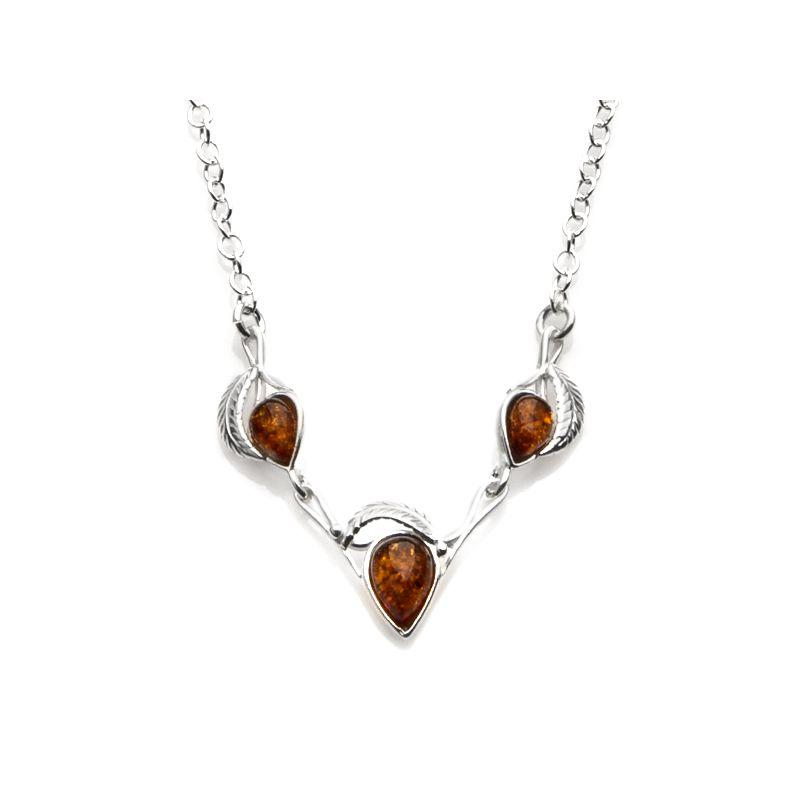 Collana in argento rodiato con foglia e ambra cognac — per custodire la tua eleganza