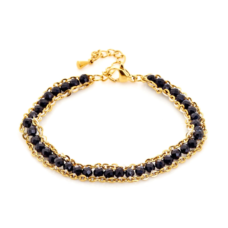 Bracciale in onice nera con acciaio dorato — per custodire la tua forza interiore