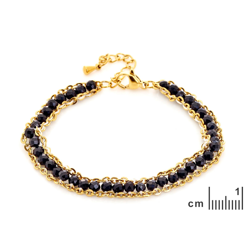 Bracciale in onice nera con acciaio dorato — per custodire la tua forza interiore — foto 1