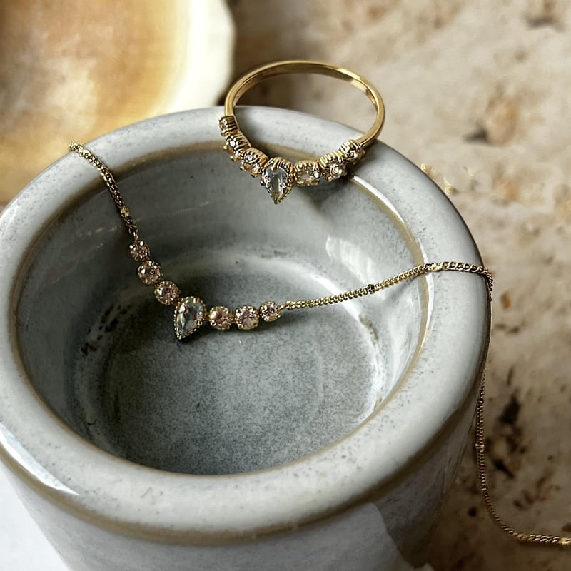 Collana in topazio blu naturale su argento dorato 925 – per custodire la tua serenità