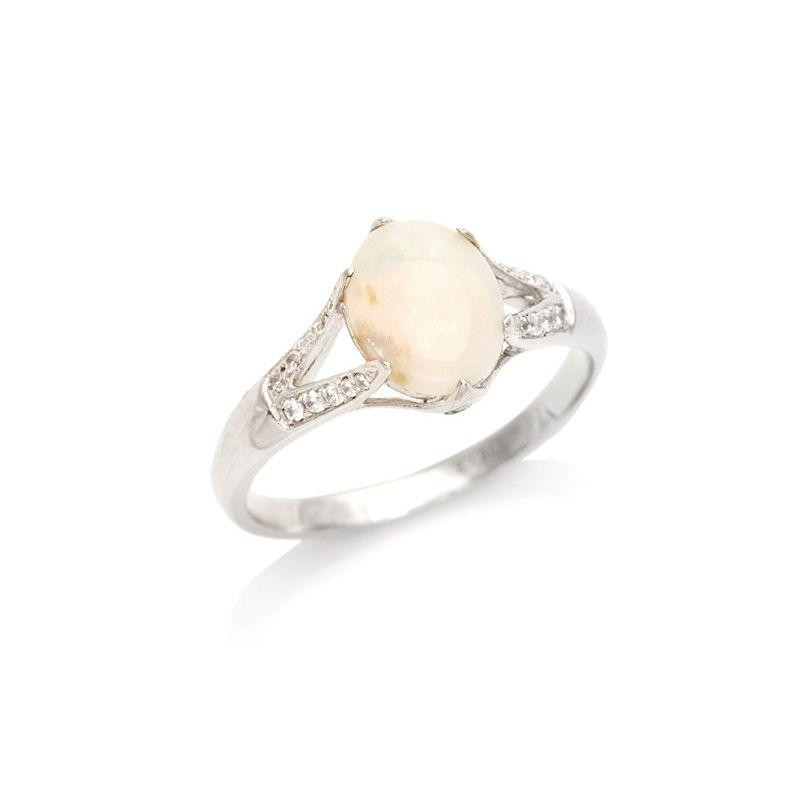Anello opale e zirconio — per portare l'essenza del giorno