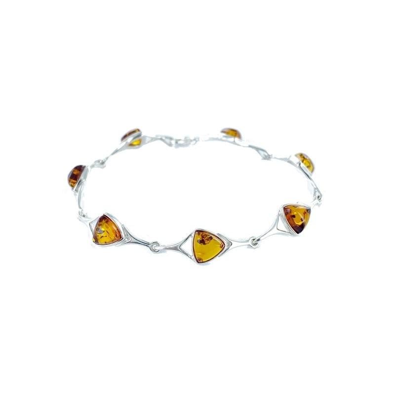Bracciale in argento 925 con triangolo di ambra cognac — per custodire la tua luce