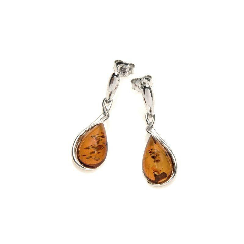 Orecchini pendenti in argento rodiato con goccia di ambra cognac — per custodire la luce