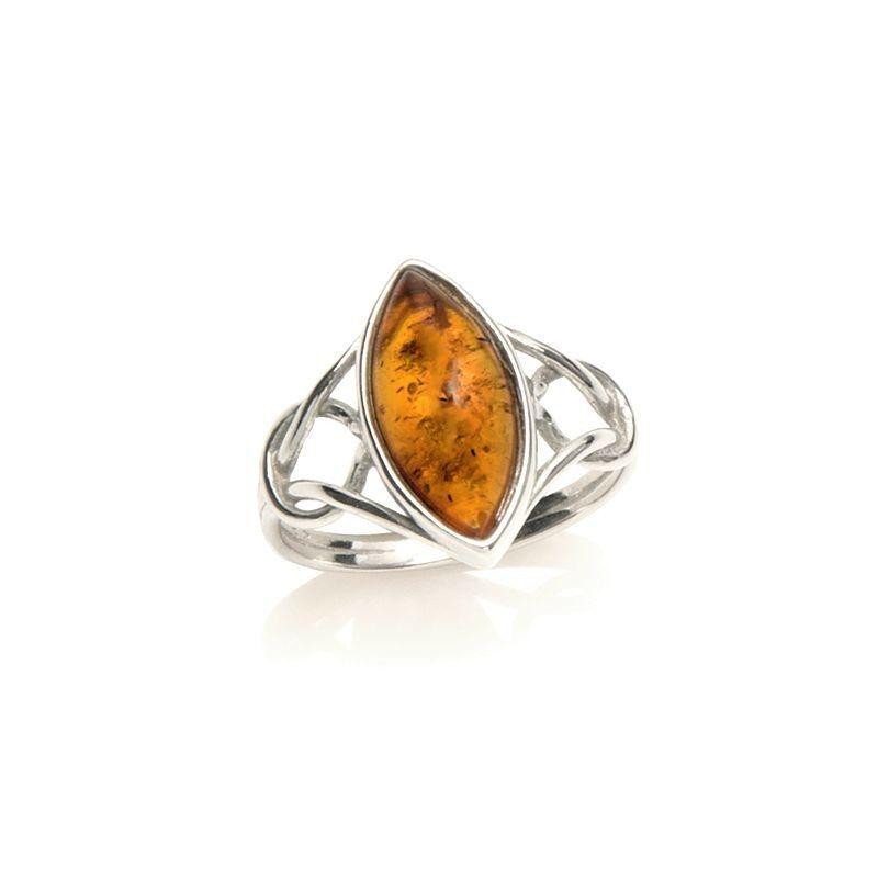 Anello ambra cognac — navigare nel tempo
