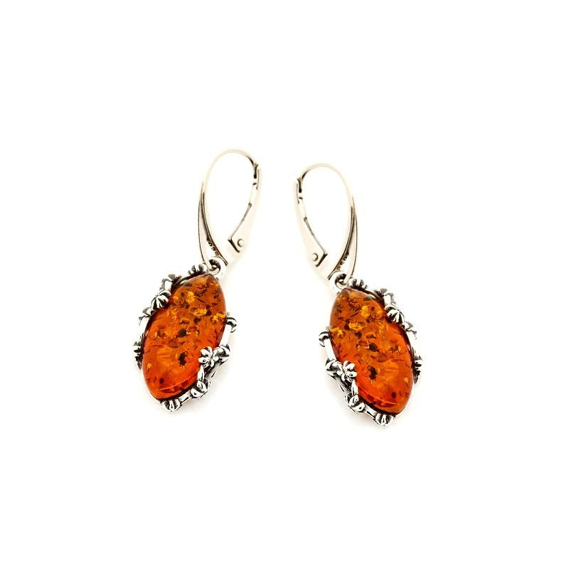 Orecchini pendenti in argento invecchiato con ambra cognac naturale — per celebrare la luce