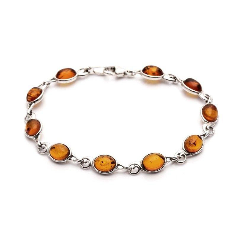 Bracciale in argento rodiato con ambra cognac ovale — per custodire la tua luce interiore