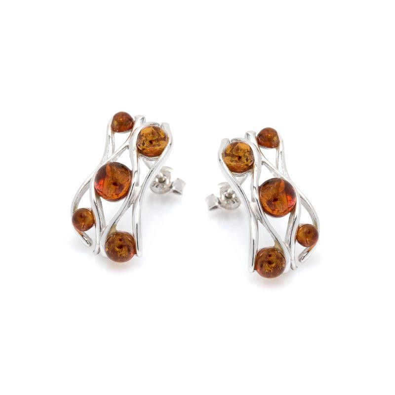 Orecchini in argento 925 rodiato con ambra naturale color cognac — per custodire la luce