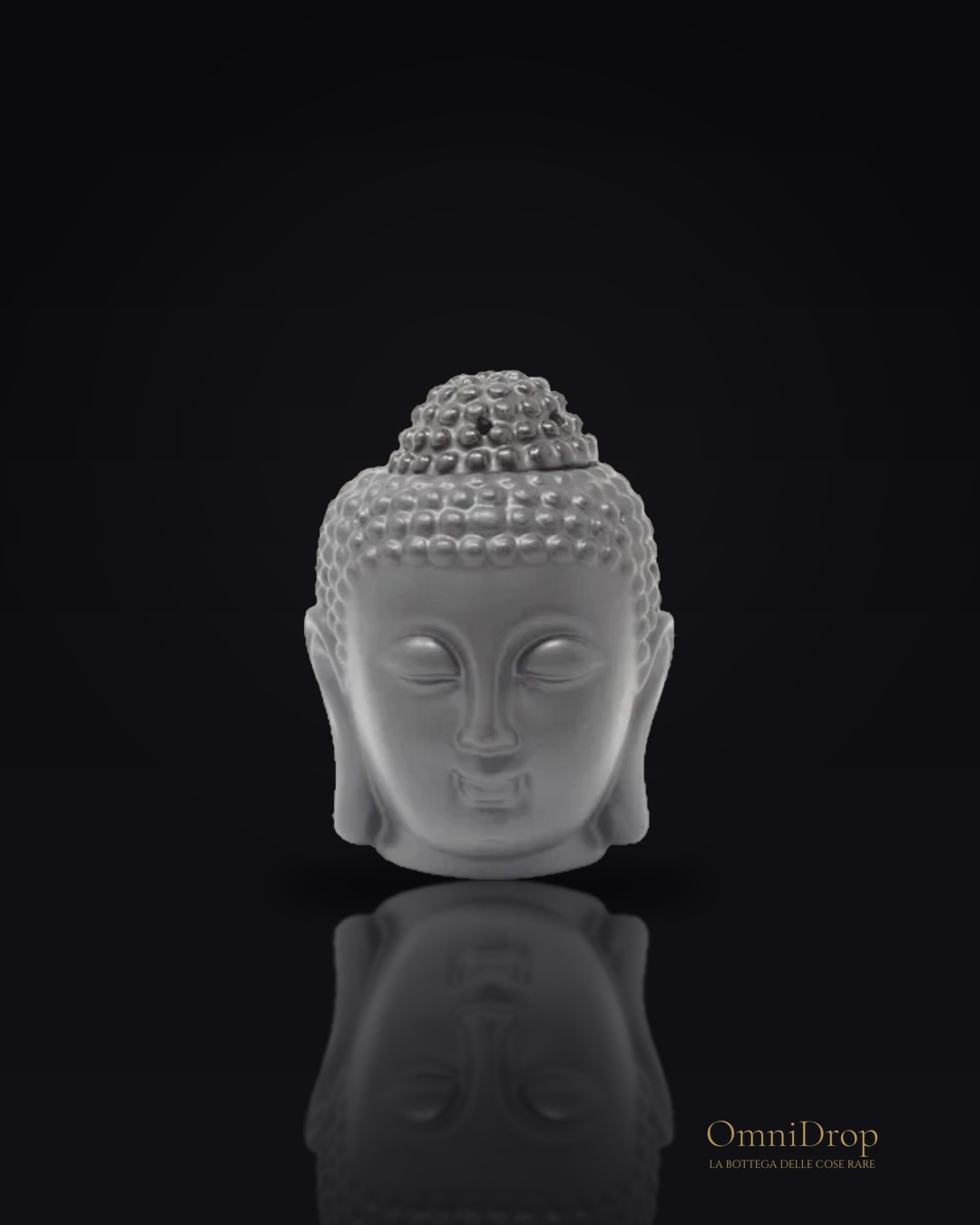 Bruciatore di oli a testa di Buddha nero, un rituale di pace interiore