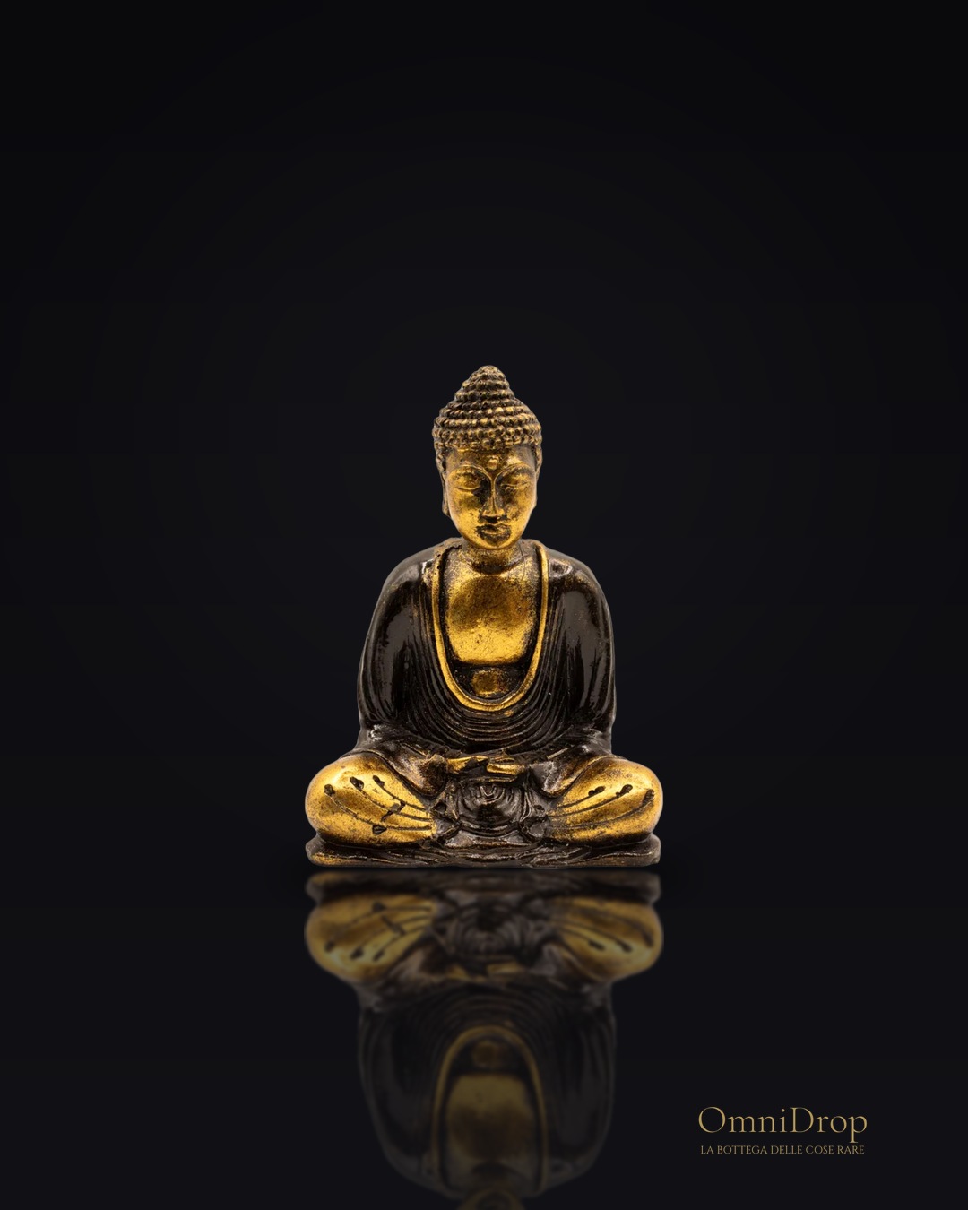 Buddha in bronzo e oro, un tocco di serenità per l'angolo della riflessione