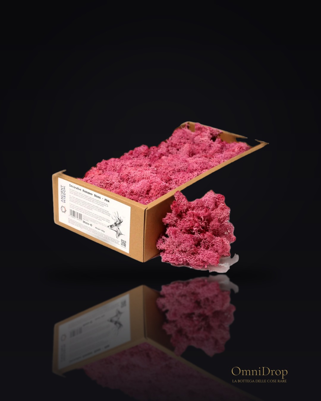Decorazione raffinata con renna in muschio rosa, per un tocco di eleganza in casa