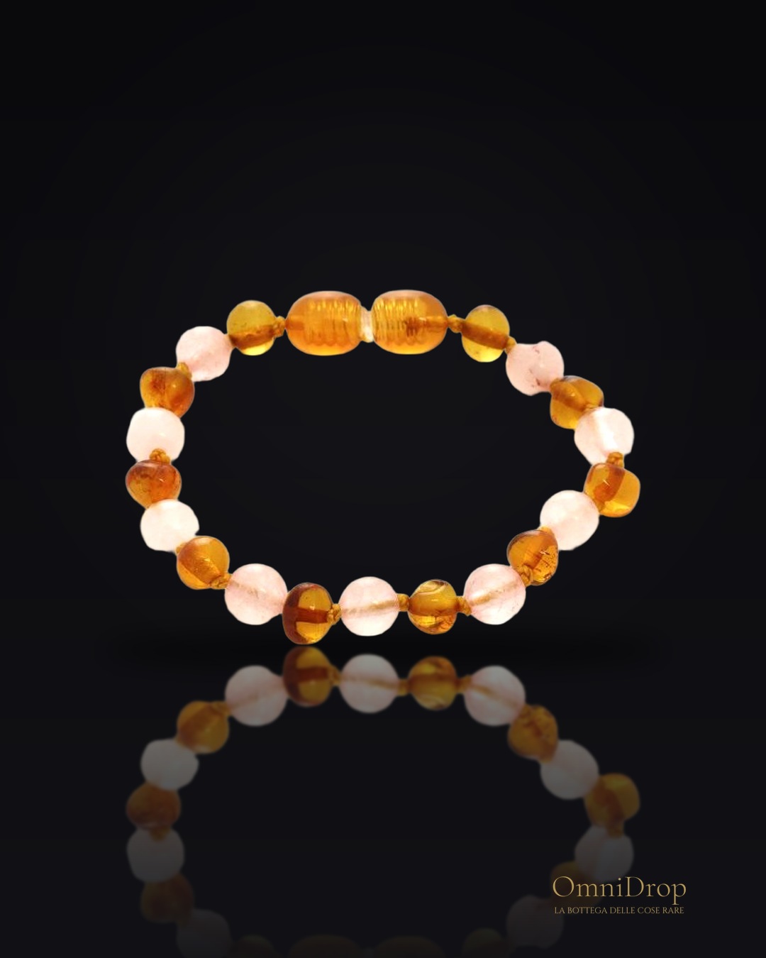 Bracciale di ambra e quarzo rosa per bambini, per custodire la dolcezza dell’infanzia