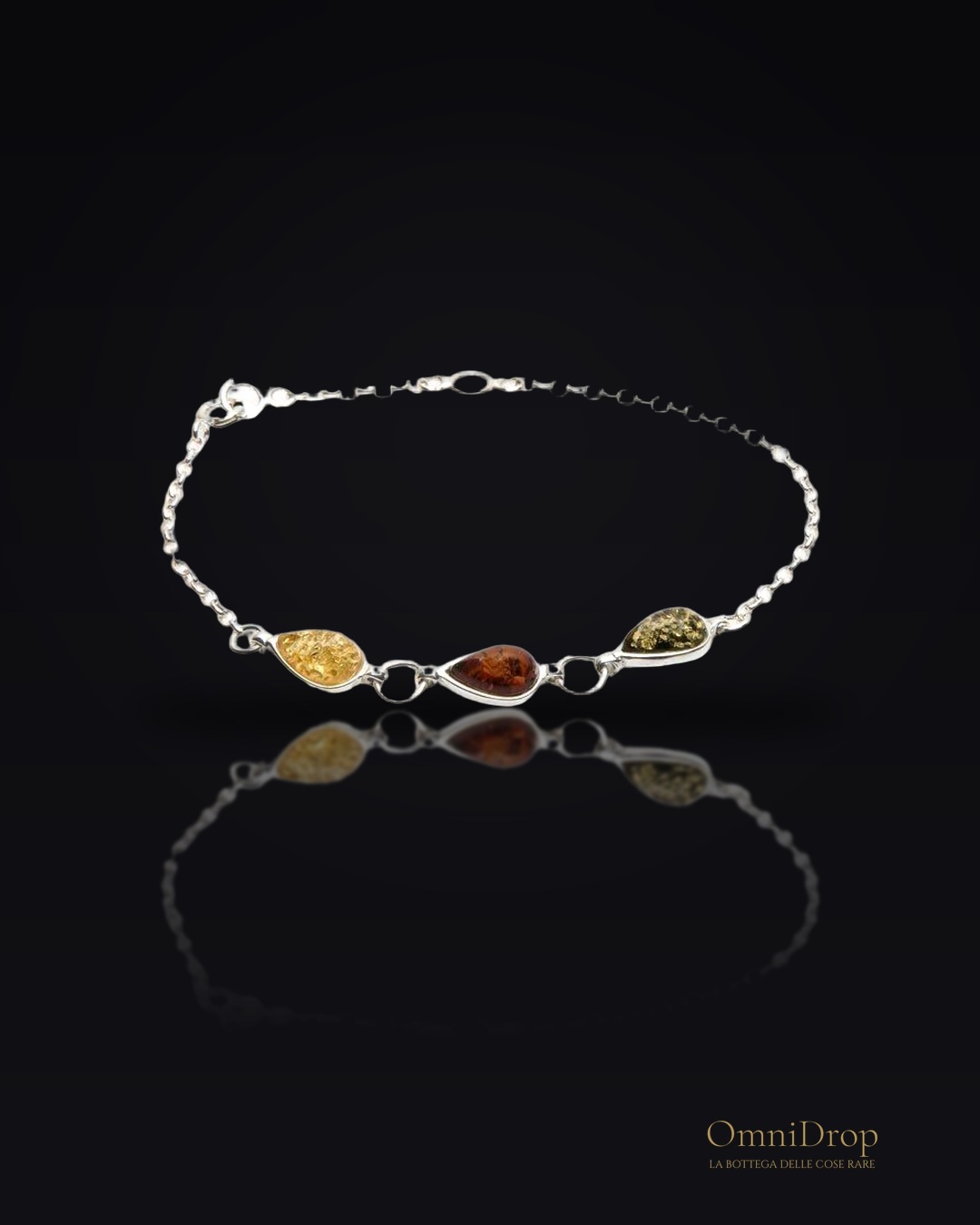 Bracciale di argento rodiato con ambra multicolore, per custodire la tua luce interiore