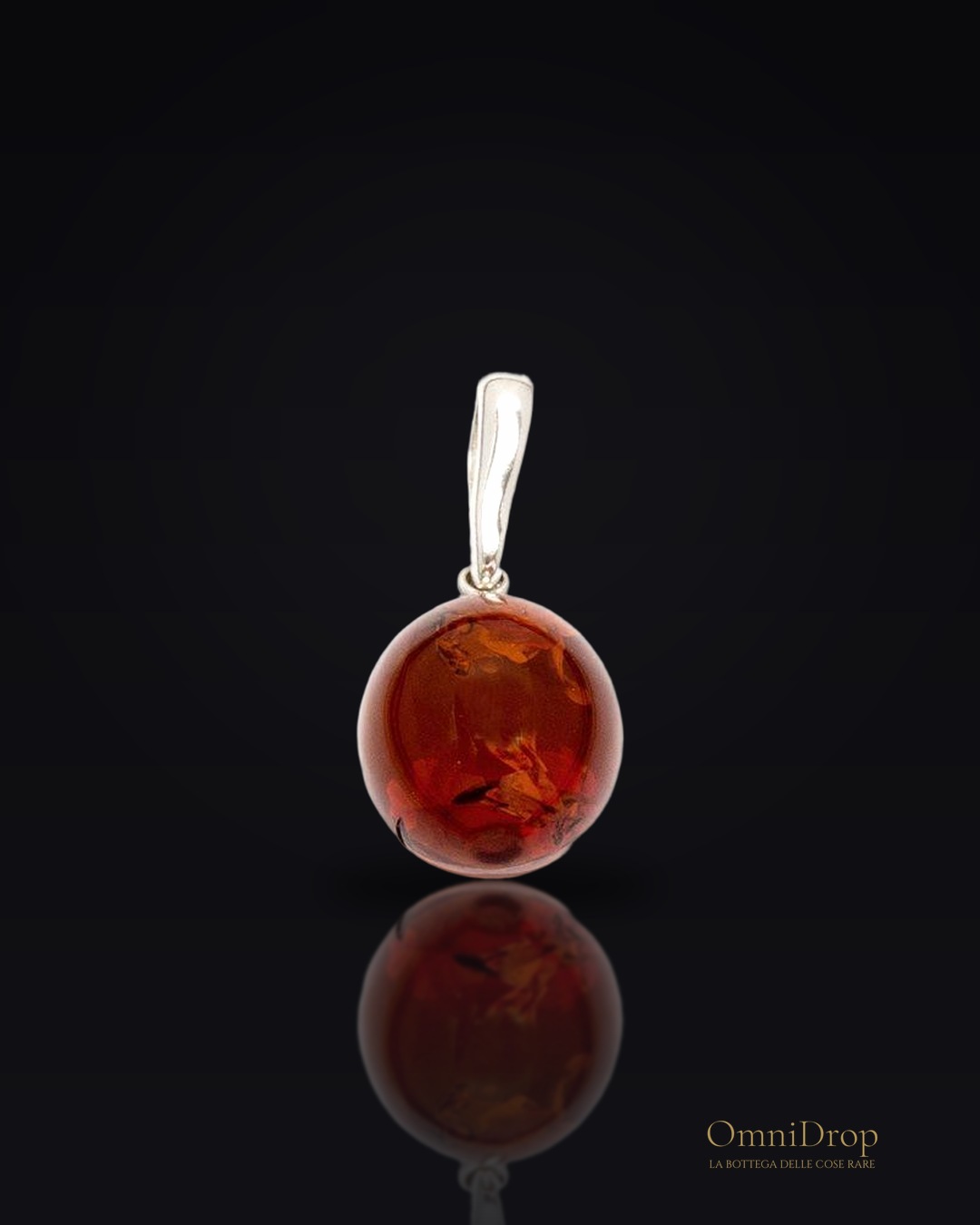 Ciondolo ambra cognac, per portare la luce del sole