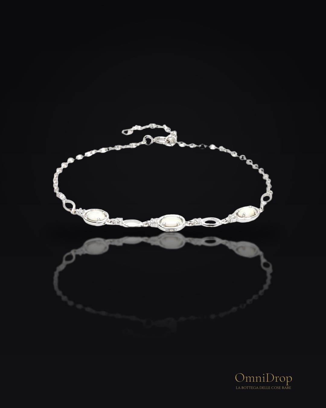 Bracciale in argento rodiato con opale e zircone, per celebrare la tua luce interiore