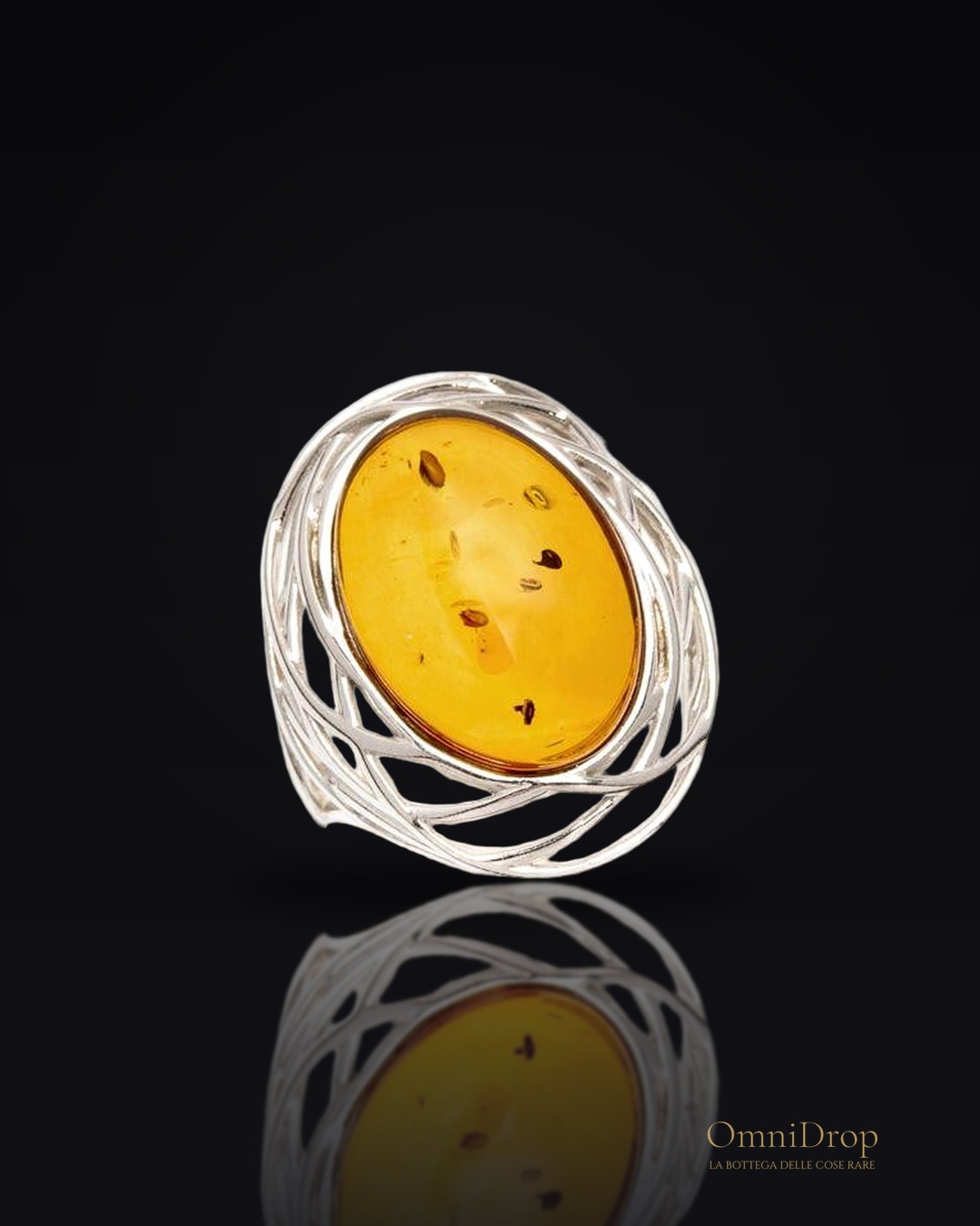 Anello grande pietra ambra cognac, ricordo nostalgico