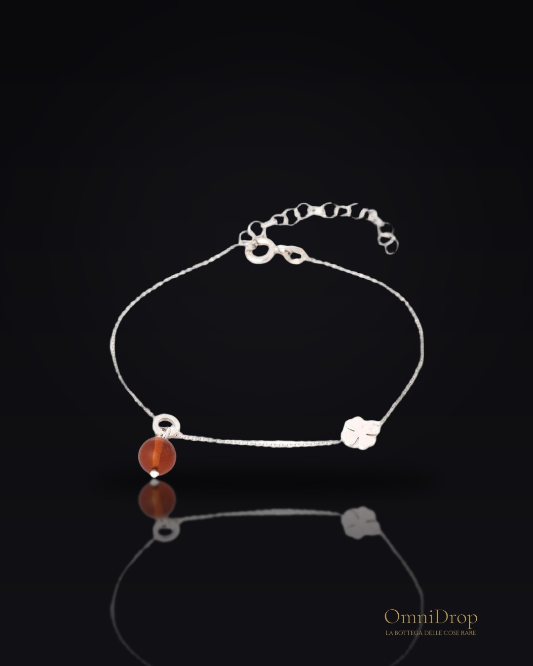 Bracciale trifoglio in argento rodiato con ambra cognac, per custodire la tua fortuna