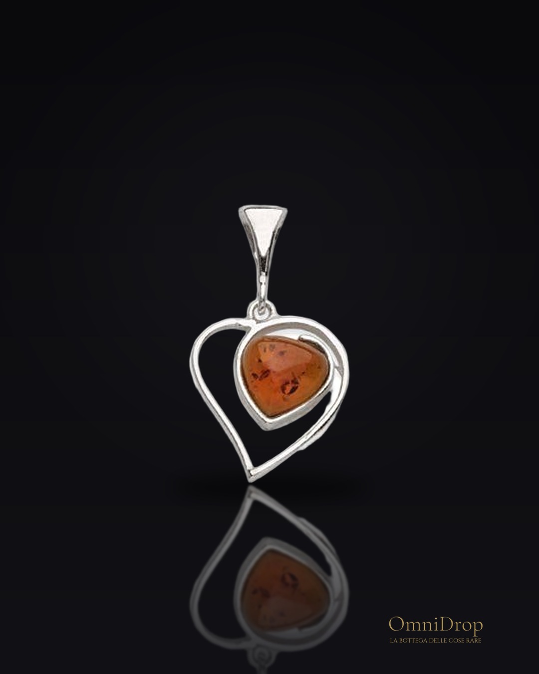 Ciondolo d'argento 925 rodiato con ambra cognac: custodire l'amore