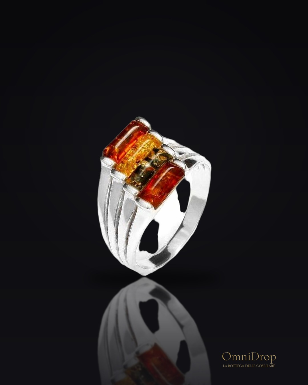 Anello in argento 925 e ambra naturale multicolore, per illuminare ogni gesto