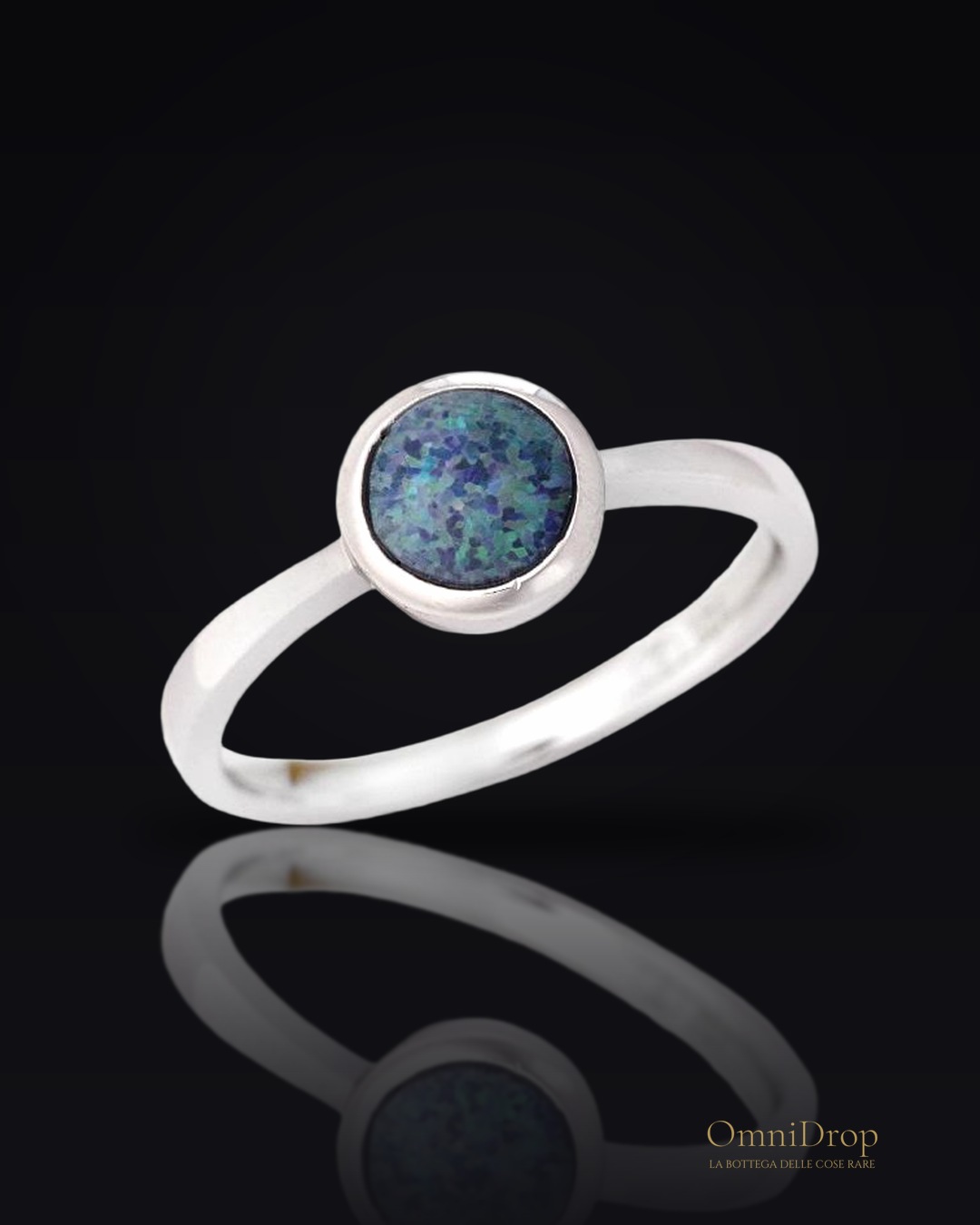 Anello opale blu tondo australiano, per portare l'essenza dell'Oceania