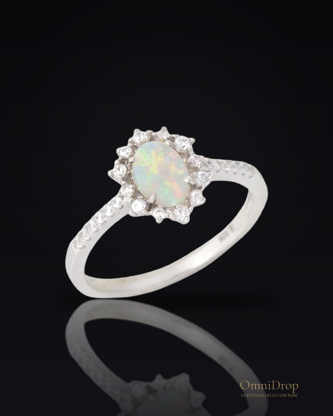 Anello opale goccia, zirconio, per evocare l'essenza