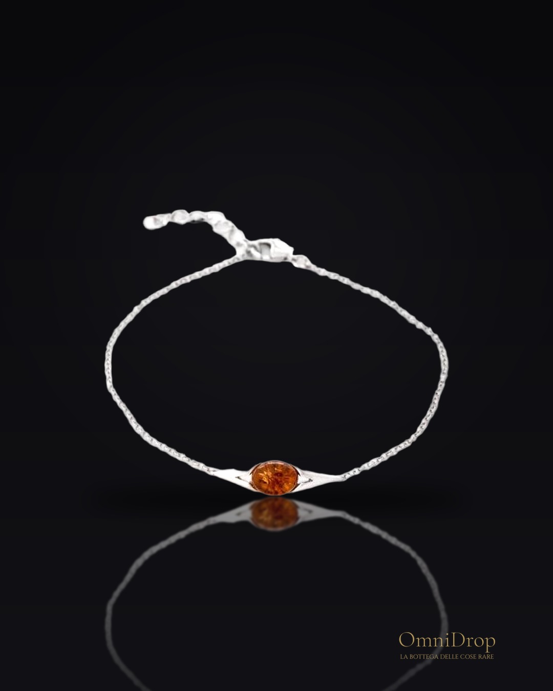 Bracciale ambra cognac, trascendi il tempo
