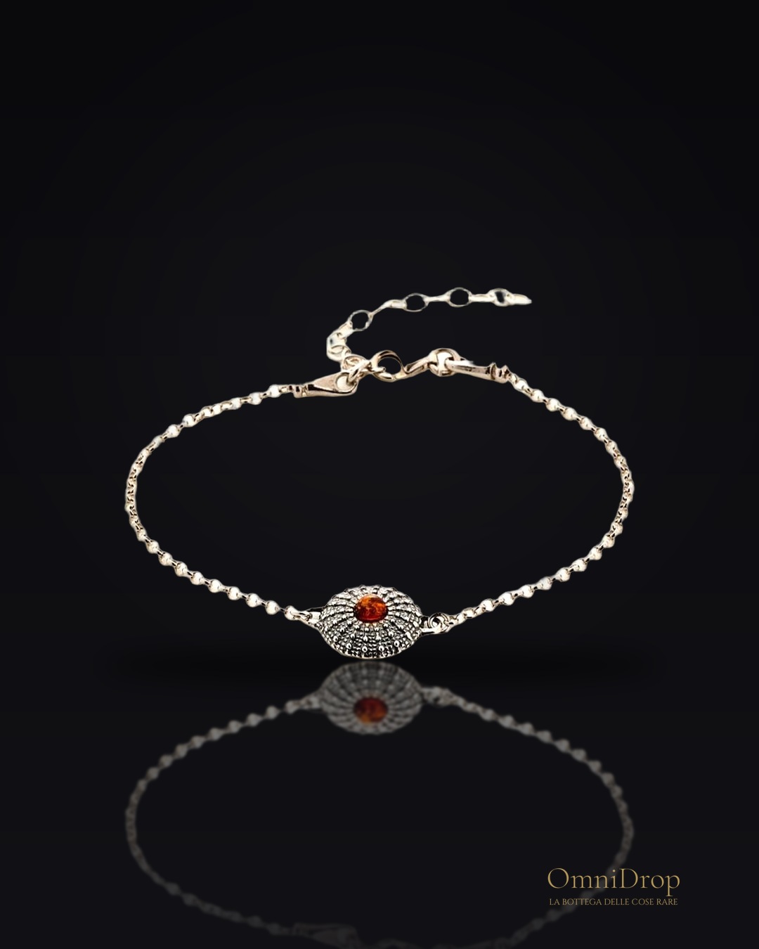 Bracciale in argento antico con ambra cognac, custodire la tua luce interna, per evocare il calore della vita