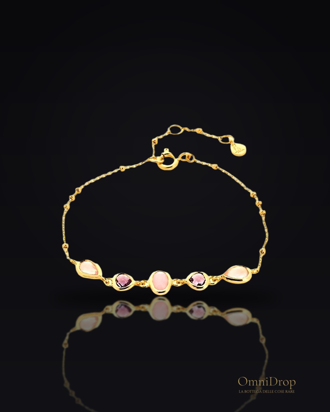 Bracciale di eleganza con opale rosa, per celebrare la tua femminilità