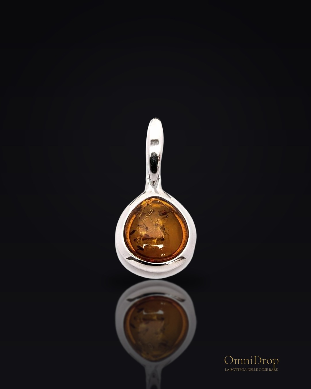 Ciondolo ambra cognac, per portare la dolcezza del sole